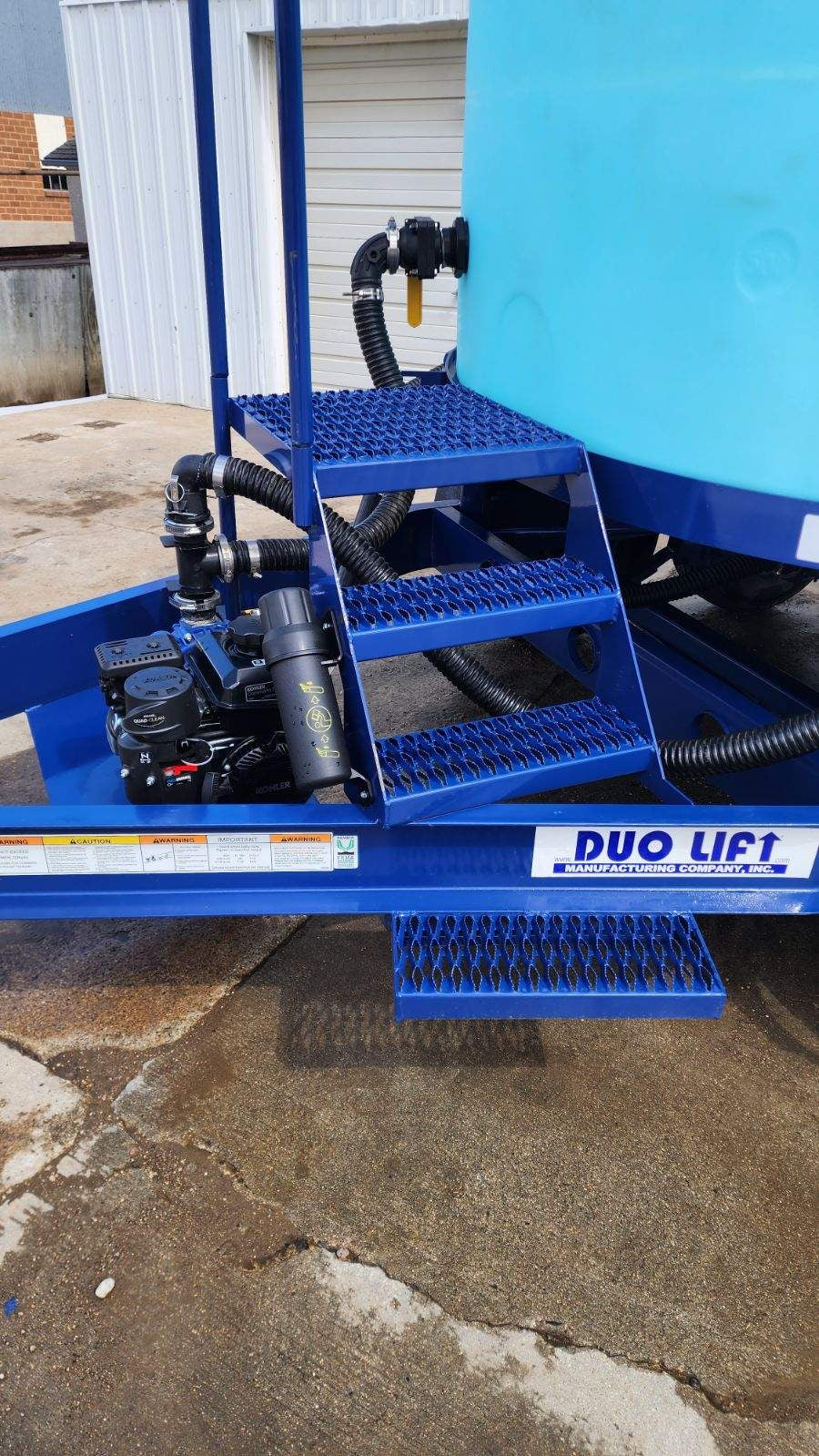 Duo-Lift 1300 gallon cone bottom tank trailer