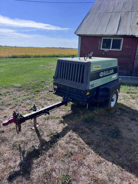 A green sullair air compressor