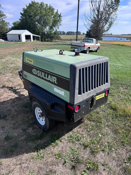 A green sullair air compressor