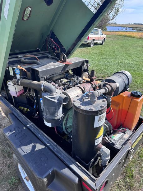 The engine of A green sullair air compressor